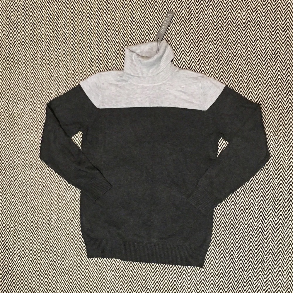 The softest sweater ever! Brand new with tags.